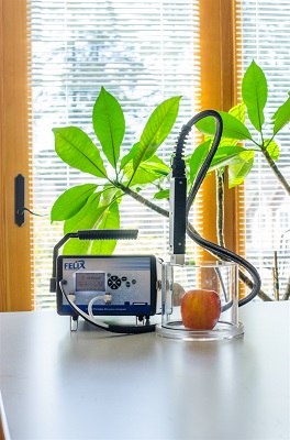 Ethylene sensor sitting on office desk