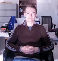 Timothy Krytenberg sitting facing camera