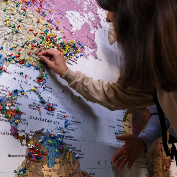 World map with pins showing different locations
