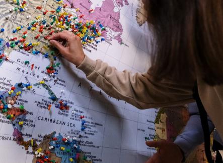 World map with pins showing different locations