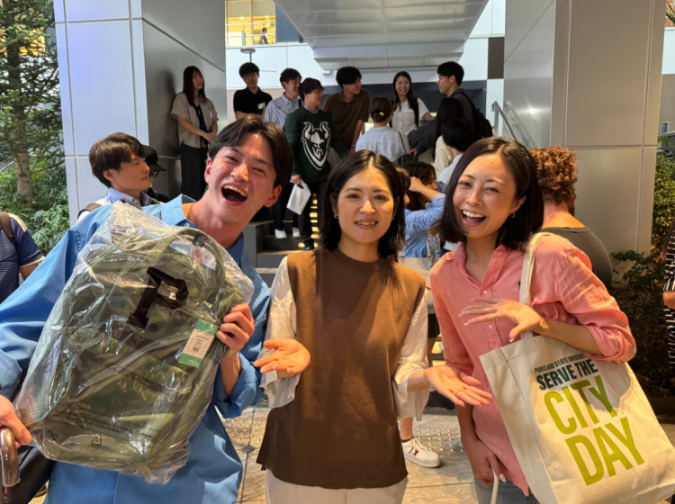 Organizer Anri Zama with winners of the Portland Gear backpack raffle