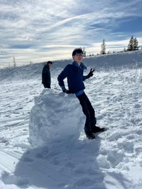 A student enjoying the snow on Mount Hood
