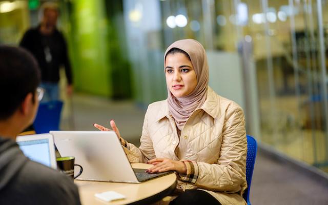female student with laptop