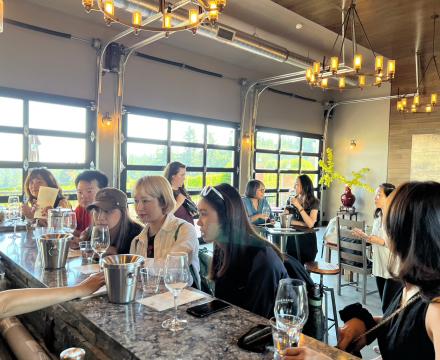 Visting teachers at wine tasting event