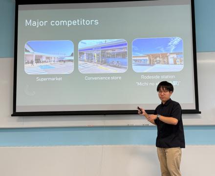 Student giving a business presentation