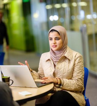 female student with laptop