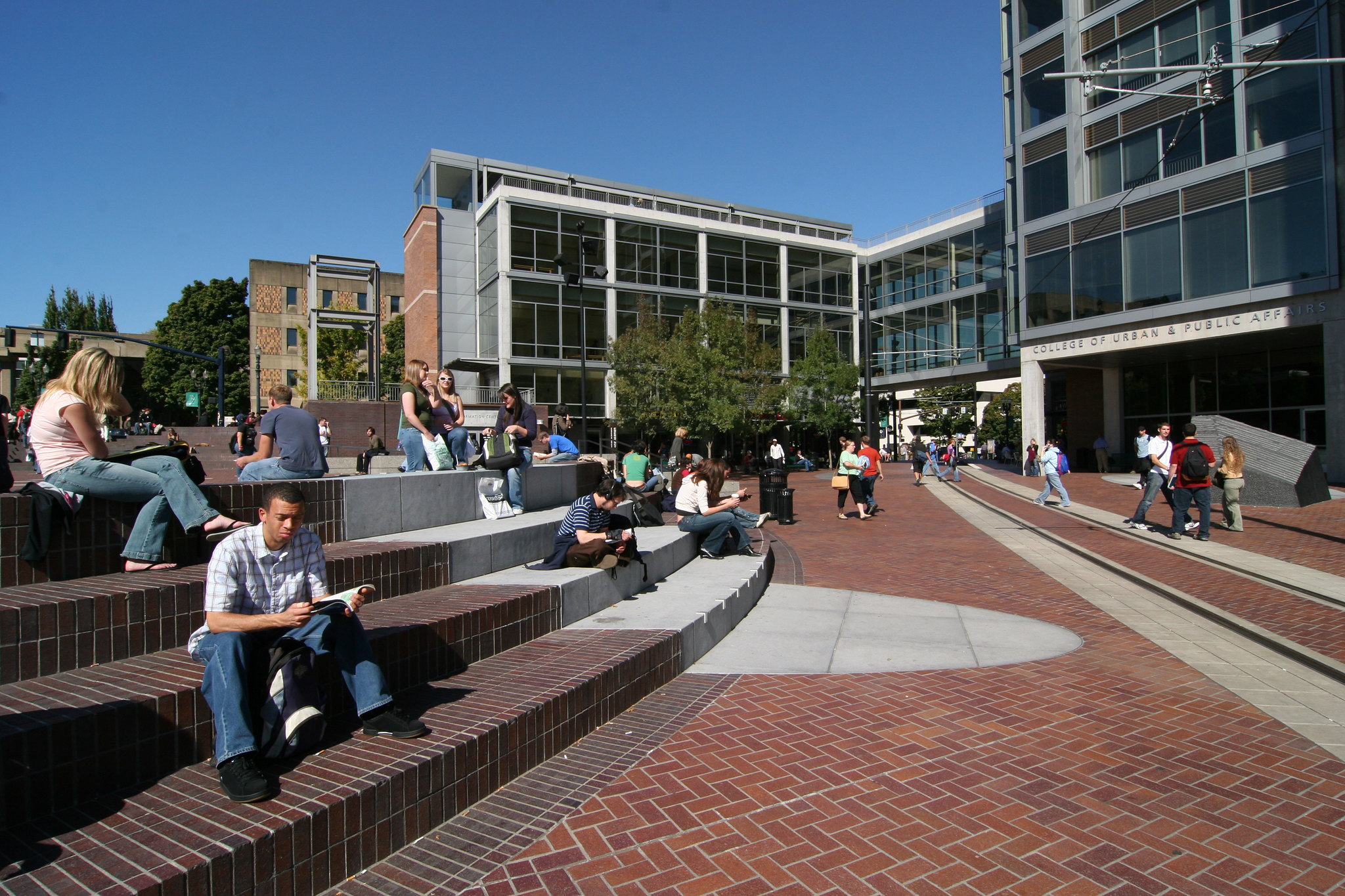 picture of people sitting in the urban plaza
