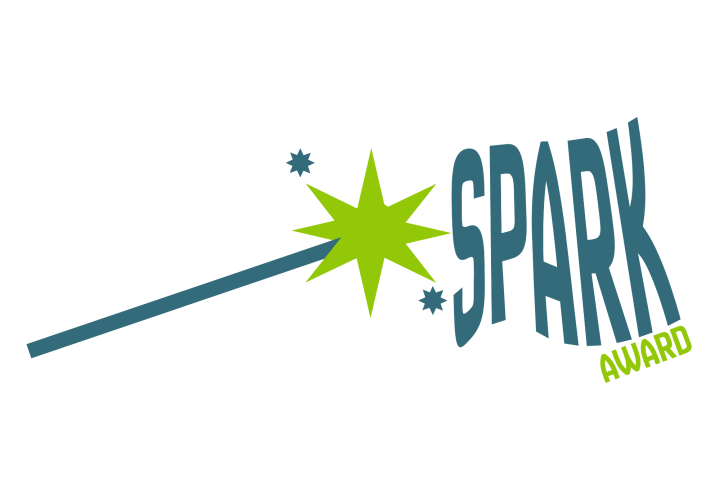 picture of a blue want with green and blue sparks and the words Spark Award