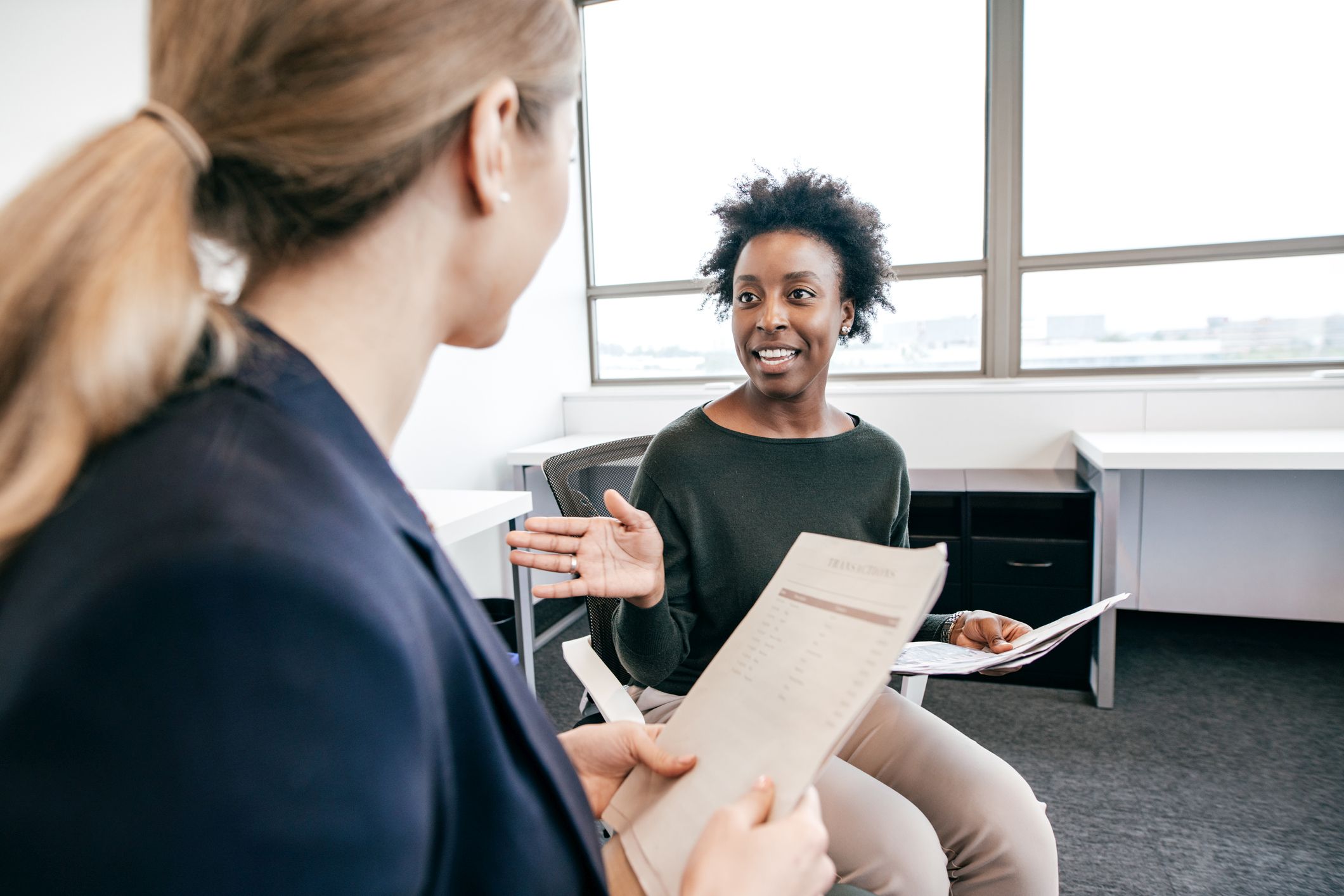 Two women speaking in a focus group