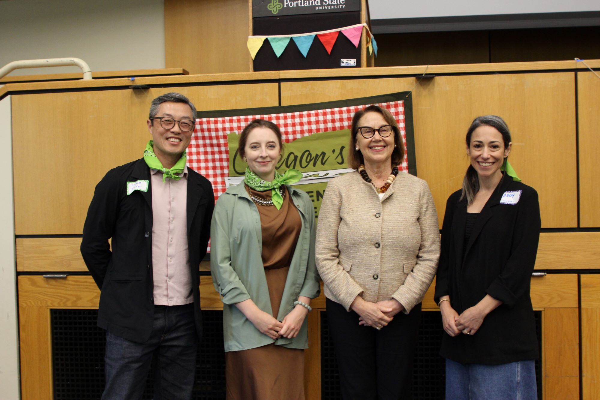 The 2026 Hatfield Futures Showcase judges standing with former Oregon Attorney General Ellen Rosenblum. The judges are, left-to-right: Mike Jung, Marta Tarantsey, and Abby Chroman.