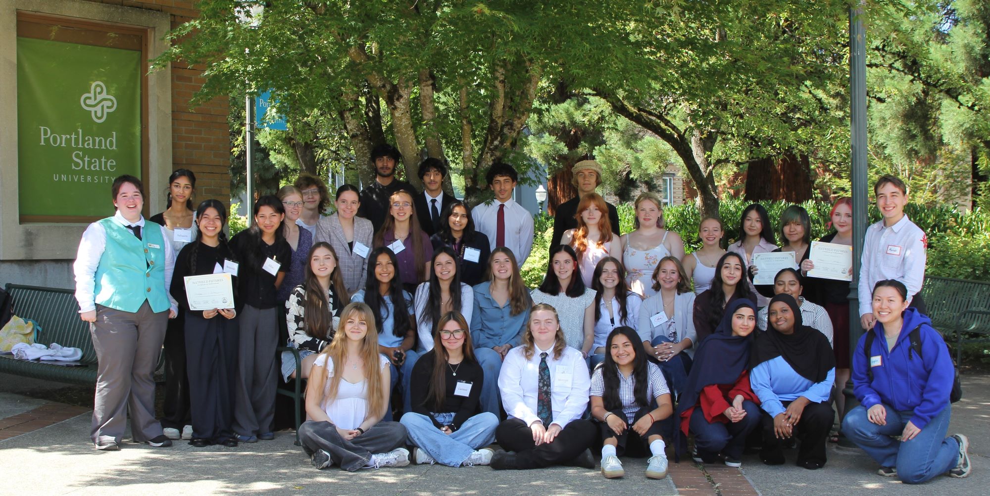 The 2026 Hatfield Futures students sitting outside as a group after the Showcase