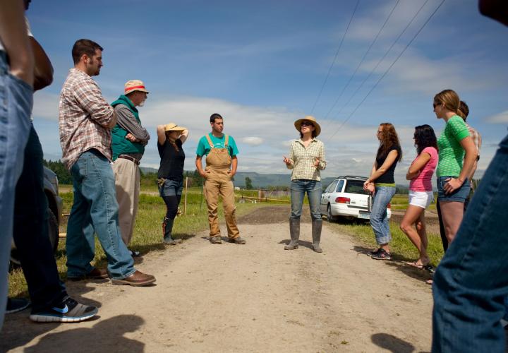 Group of students being taught in the field