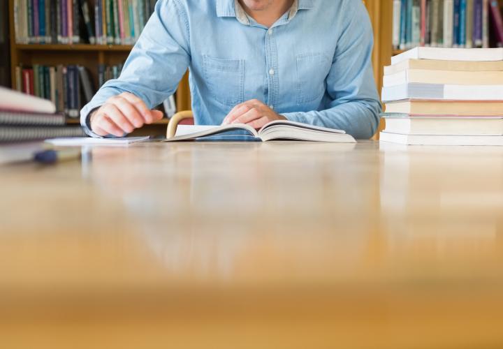 Man doing research in a library