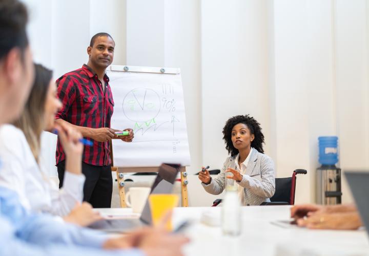 Group around table with flipchart