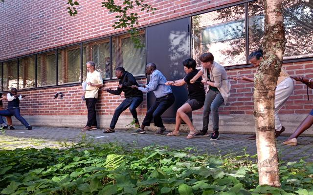 Students participate in tug-of-war exercise