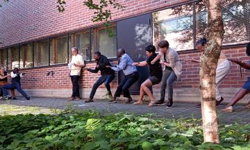 Students participate in tug-of-war exercise