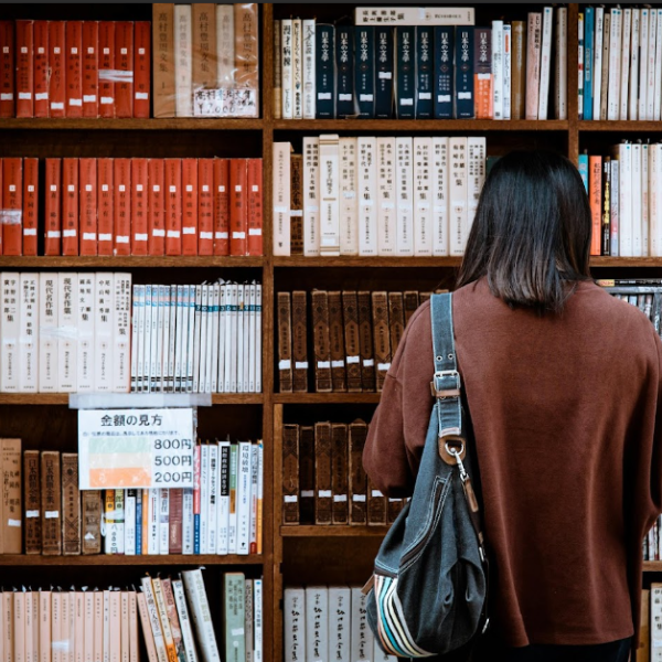 student in library