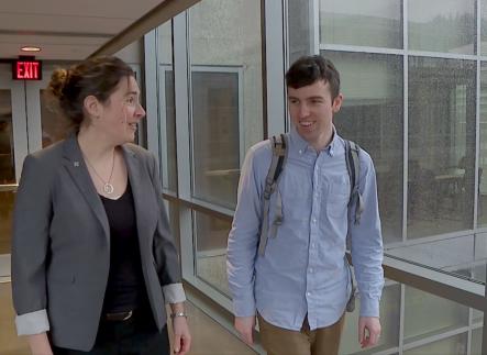 Dr. Melody Valdini meeting with student