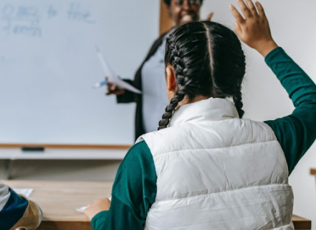 student raising hand
