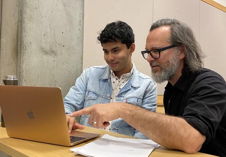Professor helping a student