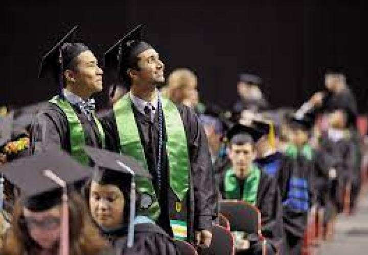 Graduating students prepare to receive their diplomas