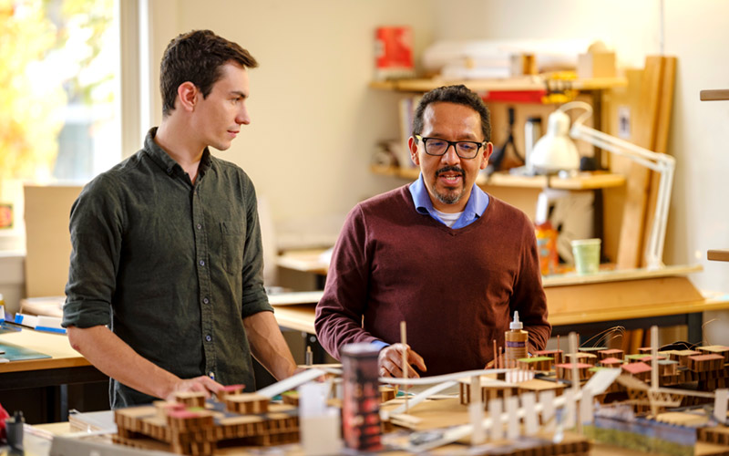 Student and faculty in architecture lab