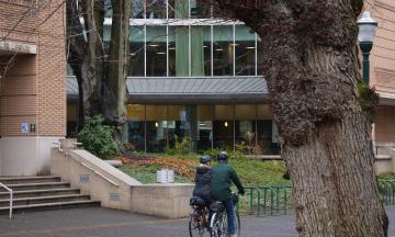 two bicyclist on the park blocks in winter light 