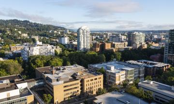 A drone shot of PSU and Portland on a spring evening with Cramer and Lincoln in the foreground.