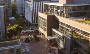 The Academic and Student Recreation Building, where the PSU Board of Trustees meets, shown from above in the morning light. 