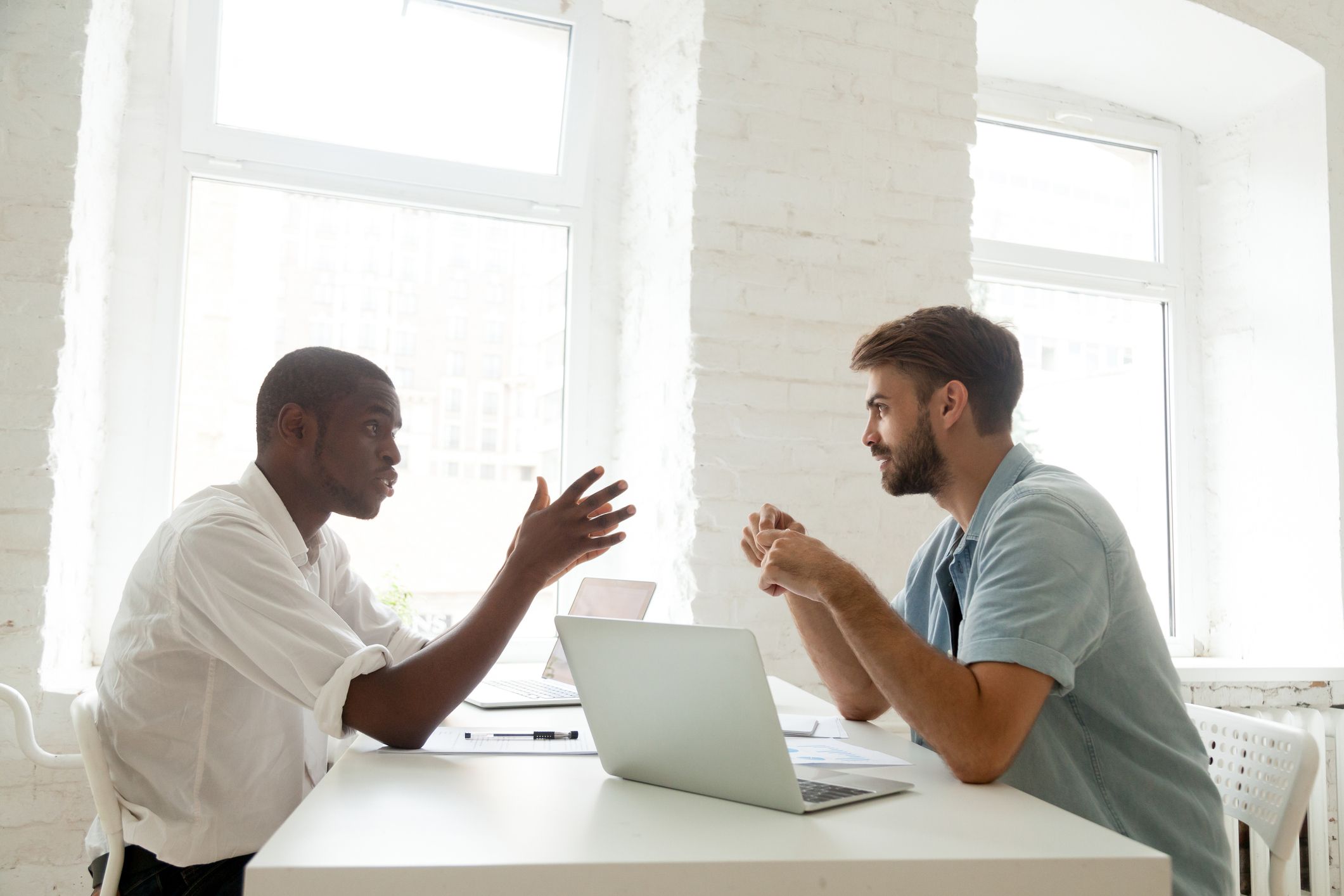 Two men talking