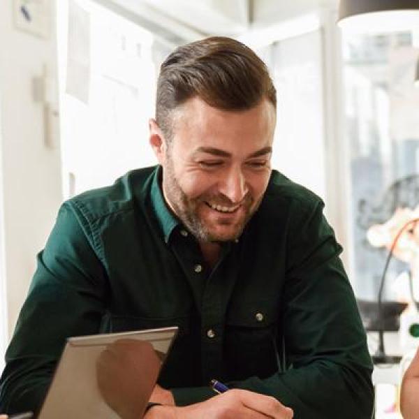 Group of smiling people in a meeting 