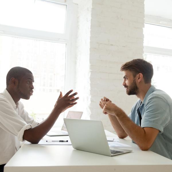 Two men talking 