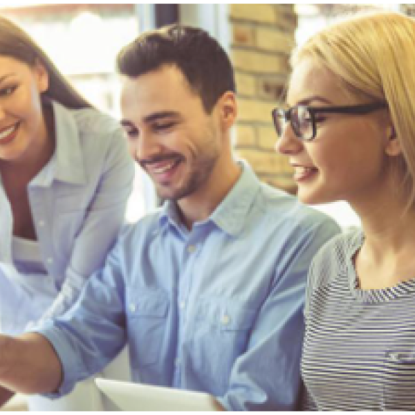 People smiling in a meeting
