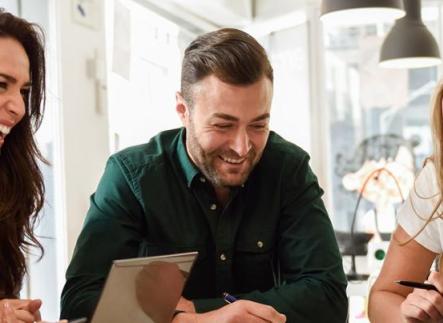 Person laughing in a meeting 