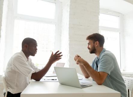 Two men talking 