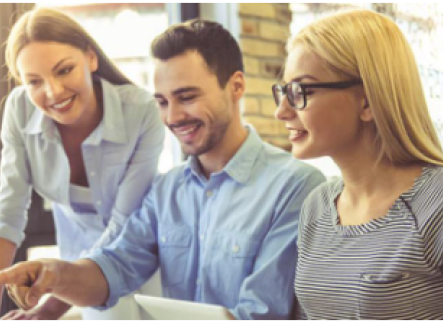 People smiling in a meeting