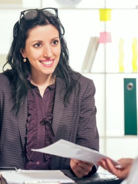 Smiling woman in a meeting