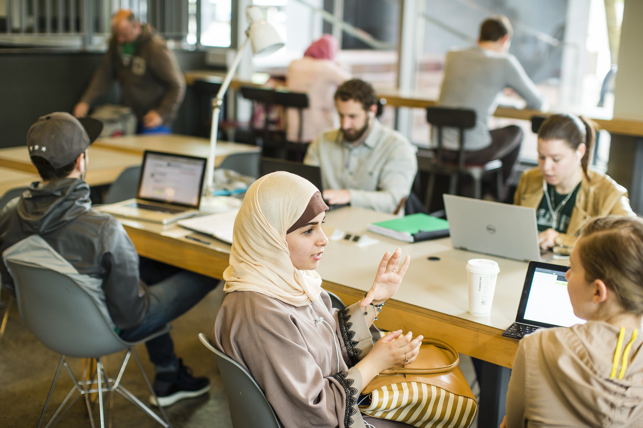 PSU online students studying in coffee shop