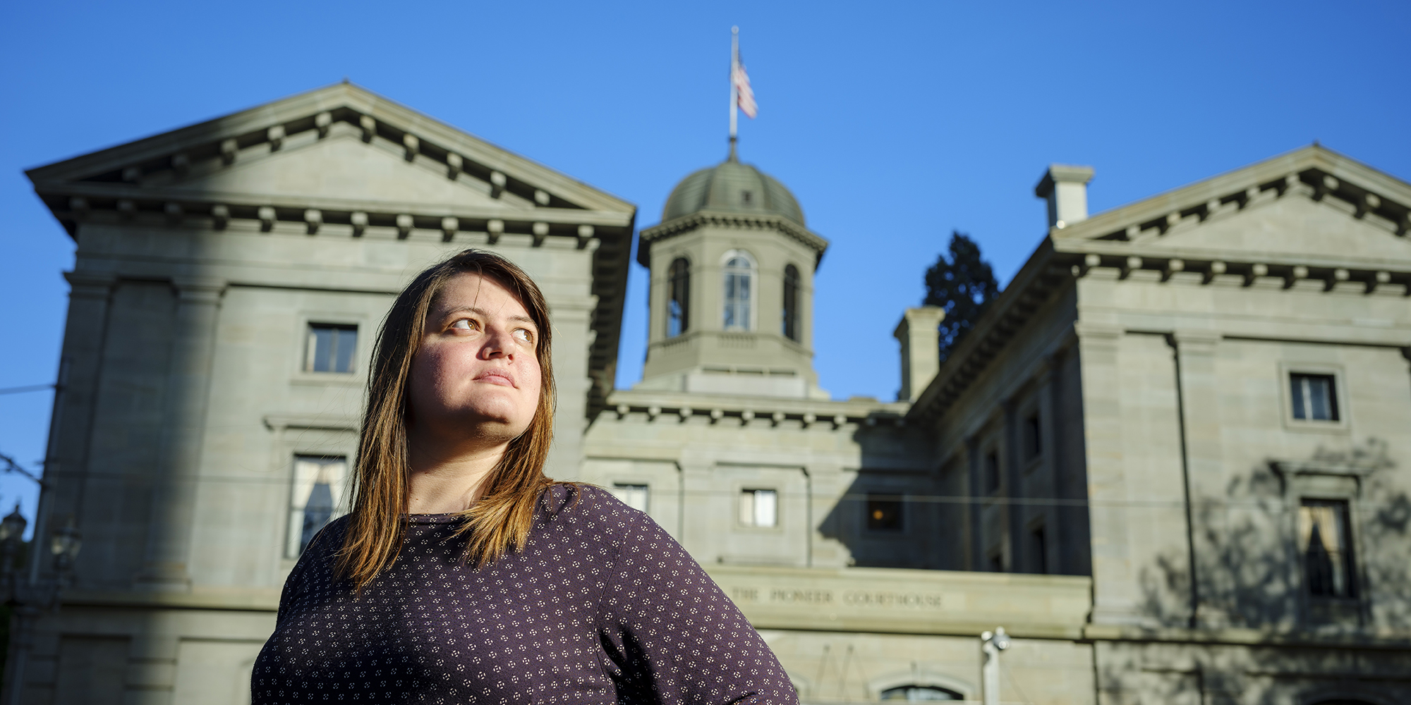 PSU online student, Lexi Winkler standing in front of Portland Courthouse