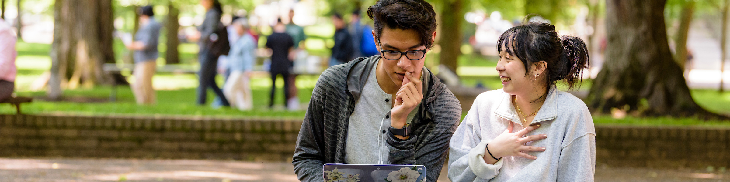 two PSU students studying in the Park Blocks