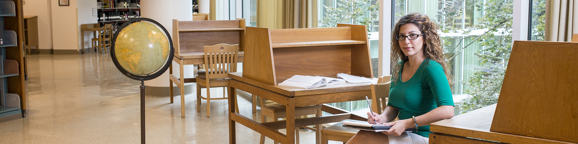 PSU student studying in the library