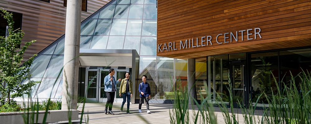 Three PSU online students leaving the School of Business