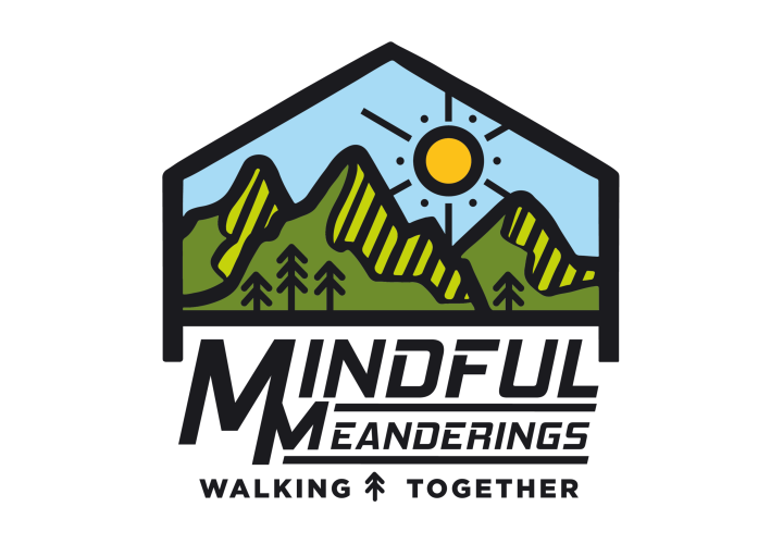 Mindful Meanderings logo. A blue sky with yellow sun and green mountains with the following text: Mindful Meanderings Walking Together