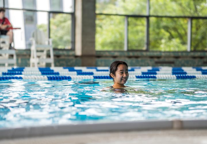Woman swimming in Rec Center pool