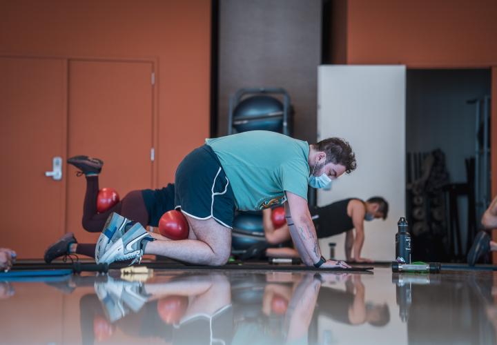 Person working out in Group X class. 