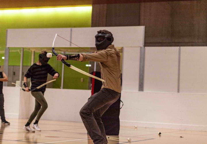 Person playing archery tag