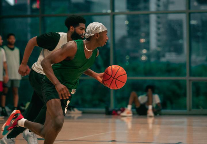 A person in a game of basketball.