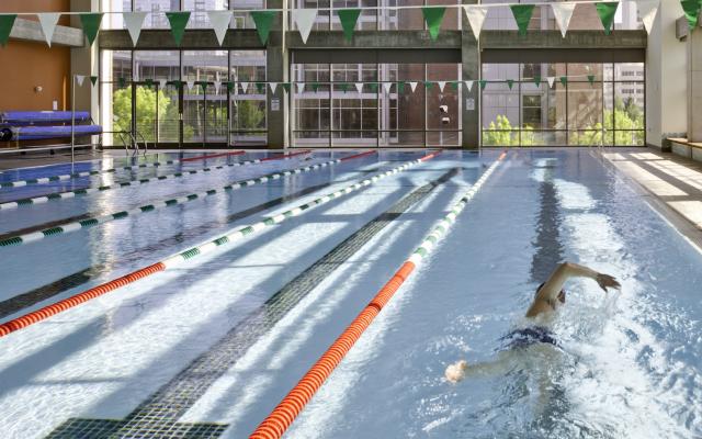A person lap swimming in the Rec Center pool.