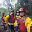 people in water sports clothing