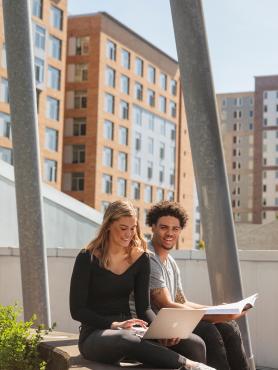 image of students in front of building